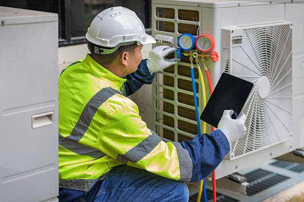 Professional Ac Installation technician working in Central City, IL